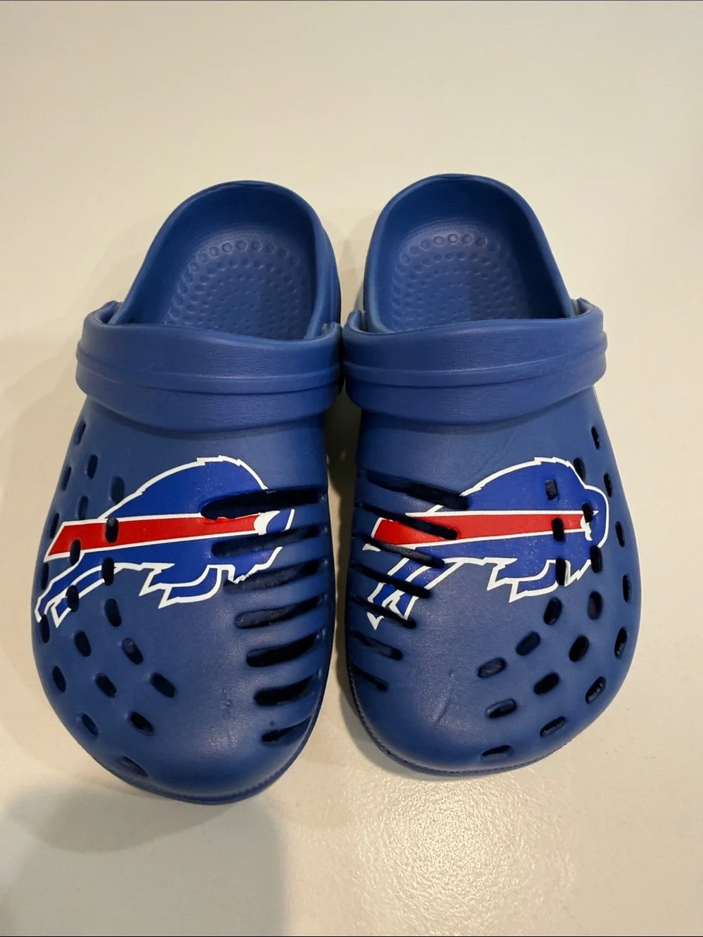 Buffalo Bills Blue Team Logo Slip-On croc-like slip-on youth shoe.